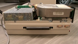 With the case top removed, there is a huge harddisk where the floppy drive is supposed to be.
